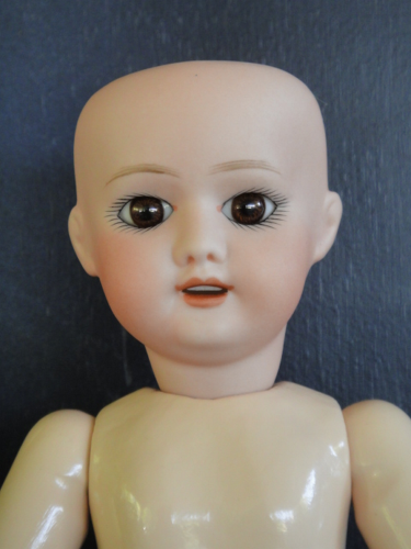Tête de poupée en porcelaine Reproduction BLEUETTE