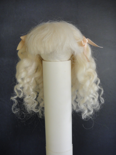A mignonette all bisque doll | Hartleys Auctioneers & Valuers